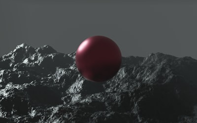 黑白山上的红球

